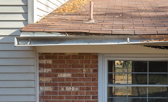 Overflowing gutters damaging fascia