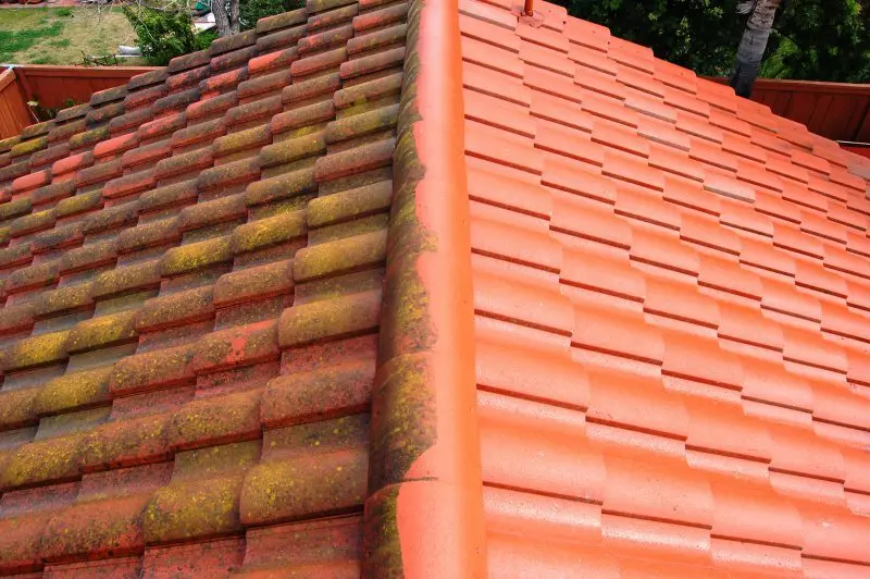 Roof cleaning in progress